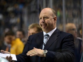 Boston Bruins head coach Claude Julien watches his team play against the Nashville Predators during the third period at Bridgestone Arena. (Don McPeak-USA TODAY Sports)