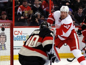 Ottawa Senators' goalie Robin Lehner (40) is beat by Detroit Red Wings' Johan Franzen (93) in the second period during NHL action at the Canadian Tire Centre in Ottawa, Ont. on Thursday February 27, 2014. Darren Brown/Ottawa Sun/QMI Agency