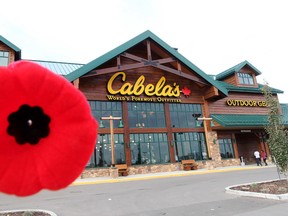 A poppy is held up outside Cabela's at 15320 - 37 Street in Edmonton. Apparently the store in north Edmonton recently asked a group of cadets selling poppies to leave. David Bloom/Edmonton Sun/QMI Agency