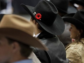 Kyle Lucas sports a poppy during the CFR Kickoff Party at the West Edmonton Mall Ice Palace on Nov. 5, 2013. IAN KUCERAKÉEdmonton Sun