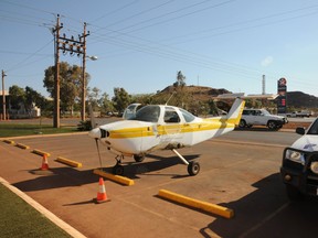 A 37-year-old Australian man has been charged with endangering life, health and safety after he purchased this airplane, drove it down the street in the Western Australia town of Newman, then parked it outside a pub. Police discovered the plane was running on gas that was inside a jerry can, which was placed inside the cabin of the plane and had a fuel line running to the engine. (Photo: Western Australia Police/Handout/QMI Agency)