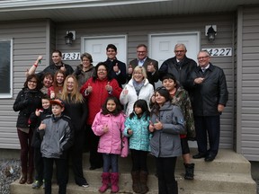 Habitat for Humanity has helped three families become proud homeowners.
