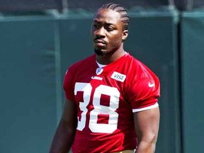 Marcus Lattimore #38 of the San Francisco 49ers watches his team during the San Francisco 49ers rookie minicamp at their training facility on May 10, 2013 in Santa Clara, California. (Photo by Jason O. Watson/Getty Images/AFP)