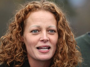 Nurse Kaci Hickox speaks with the media next to her boyfriend Ted Wilbur (not pictured) outside their home in Fort Kent, Maine in this file photo taken October 31, 2014. REUTERS/Joel Page/Files