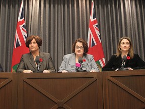 Dissenting Manitoba NDP cabinet ministers (l-r) Andrew Swan, Theresa Oswald, Jennifer Howard, Erin Selby and Stan Struthers  speak at a news conference in Winnipeg, Man. Monday Nov. 3, 2014.