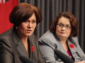 Dissenting Manitoba NDP cabinet ministers Theresa Oswald (l) and Jennifer Howard  speak at a news conference in Winnipeg, Man. Monday November 03, 2014.
Brian Donogh/Winnipeg Sun/QMI Agency