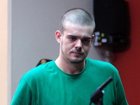 Dutch citizen Joran van der Sloot walks inside the courtroom during the reading of his verdict, in the Lurigancho prison in Lima January 13, 2012.  REUTERS/Pilar Olivares
