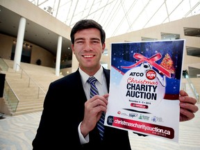 Mayor Don Iveson holds a Atco Christmas Charity Auction at City Hall in Edmonton, Alberta on Thursday, October 30, 2014. Iveson has a dinner for 4 package up for aution in support of the charity. Perry Mah/Edmonton Sun/QMI Agency