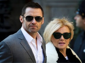 Actor Hugh Jackman and wife Deborra-Lee Furness arrives at St. Ignatius Loyola church for fashion designer Oscar de la Renta's memorial service in the Manhattan borough of New York November 3, 2014.  REUTERS/Carlo Allegri