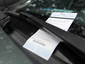A parking ticket shown on a car in the city in July of 2014.
Tony Caldwell/Ottawa Sun file photo