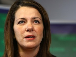 Wildrose leader Danielle Smith speaks to media in Calgary, Alta. on Sunday, Nov. 2, 2014.
Darren Makowichuk/Calgary Sun/QMI Agency