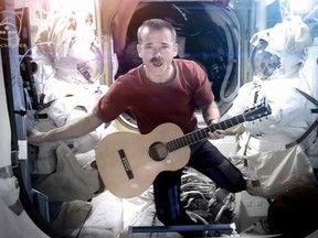 Chris Hadfield on the International Space Station performing David Bowie's 1969 hit single Space Oddity
(Screenshot from YouTube)