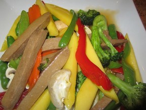 Loma House’s colourful mock-beef tofu with mango and veggies.