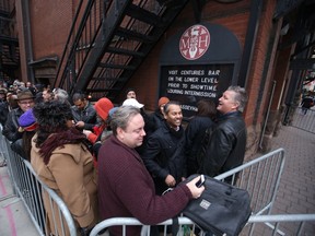 People lined up outside Massey Hall Tuesday, Nov. 4, 2014, after word leaked of a possible show by Prince later in the night. (Jack Boland/Toronto Sun)