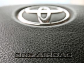 The steering wheel of a Toyota car which contains an airbag is pictured in Vienna in this April 11, 2013 file photo. (REUTERS/Heinz-Peter Bader/Files)