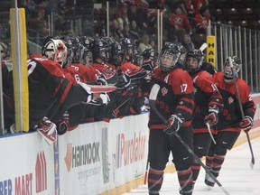 Canada Black forward Tyler Benson leads the bench celebration following his first-period goal against Canada White Monday night at RBC Centre in Sarnia. Benson's goal gave Black a 2-0 lead, but White stormed back with three goals of their own to close out the period. (TERRY BRIDGE/THE OBSERVER)