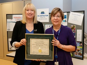 Susan Harris, certified diabetes educator, and Kathy Sterling, manager of the Diabetes and Clinical Nutrition program, hold a five-year certificate Bluewater Health received recently from the Canadian Diabetes Association. (Submitted photo)