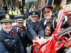 Toronto Police Chief Bill Blair (right) joined other officials in kicking off this year's Project Red Ribbon Campaign which targets drunk drivers. (STAN BEHAL, Toronto Sun)