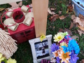 A memorial went up for Victoria Buchanan, 25, who was identified by friends as being the woman killed on Baseline Rd. after being hit by an OC Transpo bus on Monday, Nov. 3, 2014
KELLY ROCHE/OTTAWA SUN/QMI AGENCY