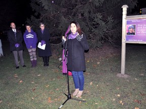 Houda El-Birani speaks at the Lighting of the Lights ceremony in Victoria Park Nov. 3, 2014. Her mother, Sonia El-Birani, is one of two women who are being posthumously honoured during this year’s Shine the Light on Woman Abuse campaign. CHRIS MONTANINI\LONDONER\QMI AGENCY
