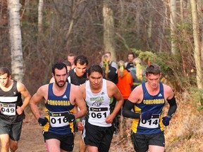 Two members of the Concordia Thunder male cross-country team show the effort that carried the squad to an ACAC championship. Kenton Sportak (left) and co-captain Ben Thomas share the championship with Michael Quick, Kirk Sundt, Cody Hogberg and Kevin Chambers, the other co-captain. (Scott Bancarz, Concordia University)