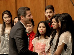 Mayor Brian Bowman meets members of the Highlights Performing Group prior to being sworn in as mayor in Winnipeg, Man. Tuesday November 04, 2014.
Brian Donogh/Winnipeg Sun/QMI Agency