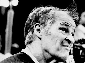 Hockey great Gordie Howe sits on the bench between shifts against the Edmonton Oilers on Oct. 17, 1978 at the Northlands Coliseum. (Edmonton Sun/QMI Agency)