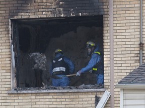 Ontario Fire Marshall investigators were probing Monday's Oxford St. E apartment fire. DEREK RUTTAN/ The London Free Press /QMI AGENCY