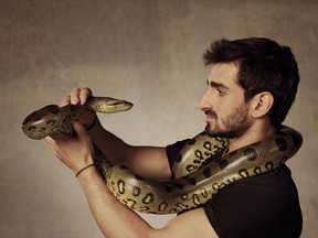 American explorer, author and Amazon expert Paul Rosolie will wear a snake-proof suit and get eaten by an anaconda for an upcoming special on Discovery in Dec. 2014. (Photo: Discovery/Handout/QMI Agency)