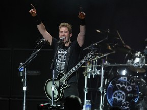 Chad Kroeger, lead singer for the band Nickelback  performs at McMahon Stadium during the Alberta Flood Aid Concert in NW Calgary, Alta. on Aug15,2013. Stuart Dryden/Calgary Sun/QMI Agency