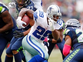 Dallas Cowboys running back DeMarco Murray (29) rushes for a touchdown against the Seattle Seahawks during the fourth quarter at CenturyLink Field. (Joe Nicholson/USA TODAY Sports)