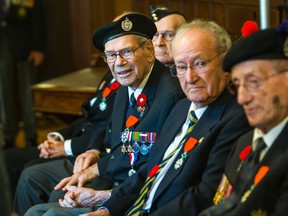 Canadian veterans of the Second World War receive the Legion of Honour to mark the 70th Anniversary of D-Day at Canadian Forces College in Toronto on Wednesday November 5, 2014. (Ernest Doroszuk/Toronto Sun)