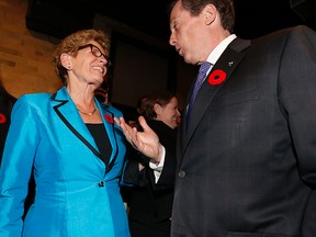 Ontario Premier Kathleen Wynne meets Toronto's Mayor-elect John Tory for the first time since his election at a launch for HeForShe campaign in downtown Toronto on Wednesday November 5, 2014. (Michael Peake/Toronto Sun)