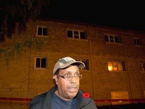 People Helping People?s Keith Charles outside 1451 Oxford St. E. after the Nov. 3 fire. (Free Press file photo)