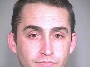 David Michael Kalac, 33, is accused of brutally murdering his girlfriend then posting gruesome pictures of the scene onto the Internet.
(Photo courtesy of Portland Police Bureau)