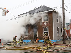 Firefighters battle a house fire on Alder Street in this file photo. (John Lappa/Sudbury Star)