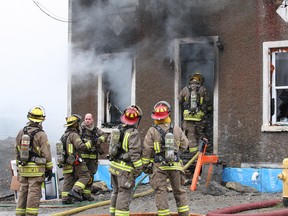 JOHN LAPPA/THE SUDBURY STAR
In this 2014 file photo, firefighters battle a house fire on Alder Street in Sudbury's west end.