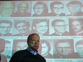 Abuse victim Joe Iacono looks on during a news conference where thousands of documents on victims of sexual abuse by Roman Catholic clergy from the Chicago Archdiocese were released in Chicago, Illinois, January 21, 2014. The documents concern 30 former Chicago-area priests accused of abusing minors during the last half century, according to the Archdiocese, one of the largest in the United States with 2.2 million Catholics. Both Angel and Severino were abused. REUTERS/Jim Young