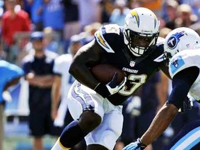 Le'Ron McClain #33 of the San Diego Chargers rushes against the Tennessee Titansat LP Field on September 22, 2013 in Nashville, Tennessee. (Frederick Breedon/Getty Images/AFP)