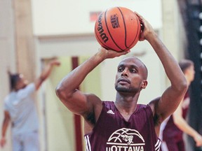 Fifth-year University of Ottawa Gee-Gees guard Johnny Berhanemeskel​ practises at the school Wednesday night. The Gee-Gees star is about to break the school's record for total points, likely Friday night as Ottawa opens its season against McMaster. (Chris Hofley/Ottawa Sun)