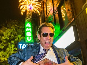 Michael Wekerle, from CBC’s hit show Dragons' Den, poses outside of the El Mocambo after his purchase of the legendary Toronto venue on Thursday, November 6, 2014. (Ernest Doroszuk/Toronto Sun)