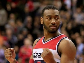 John Wall and the Wizards take on the Raptors Friday night at the ACC. (AFP)