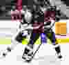 Ottawa Senators' Kyle Turris is pursued by Minnesota Wild' Mikko Koivu during NHL hockey action at the Canadian Tire Centre in Ottawa, Ontario on Thursday November 6, 2014. Errol McGihon/Ottawa Sun/QMI Agency