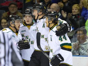 Michael McCarron, second from right, celebrates his first of two goals for the Knights with Max Domi, left, Aiden Jamieson and Dakota Mermis during their Ontario Hockey League game Thursday night against the Guelph Storm at Budweiser Gardens. (Mike Hensen/The London Free Press)