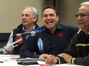 Ghislain Picard, Perry Bellegarde and Leon Jourdain (from left) share a laugh during a forum for the Assembly of First Nations candidates for national chief at the Holiday Inn Winnipeg Airport on Thu., Nov. 6, 2014. Kevin King/Winnipeg Sun/QMI Agency