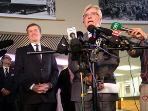 City manager Joe Pennachetti, speaking in front of Mayor-elect John Tory, discusses hisdecision to delay his retirement at City Hall on Thursday,Nov. 6. (DAVE ABEL/Toronto Sun)