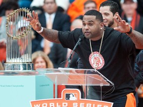 San Francisco Giants third baseman Pablo Sandoval speaks to the crowd during the World Series celebration at City Hall on Oct 31, 2014 in San Francisco, CA, USA. (Ed Szczepanski/USA TODAY Sports)