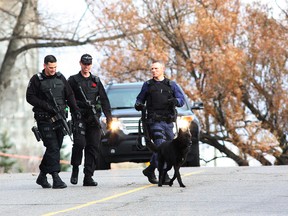 The Greater Sudbury Police canine unit and tactical unit responded to a robbery at Wilson Pharmacy in Copper Cliff on Friday afternoon. JOHN LAPPA/THE SUDBURY STAR/QMI AGENCY