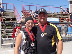 Becki Monaghan of the River City Hornets, seen here with her father Dale, has been working hard for a full scholarship to play softball for an NCAA Division 1 university. - Photo Supplied