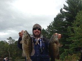 Nickel City Bass club president Marty Guenette shows off a pair of 4.5-pound smallmouth bass he caught during the club's season-ending Classic tournament on the West Arm of Lake Nipissing on Sept. 14. The club will host six open tournaments next year.